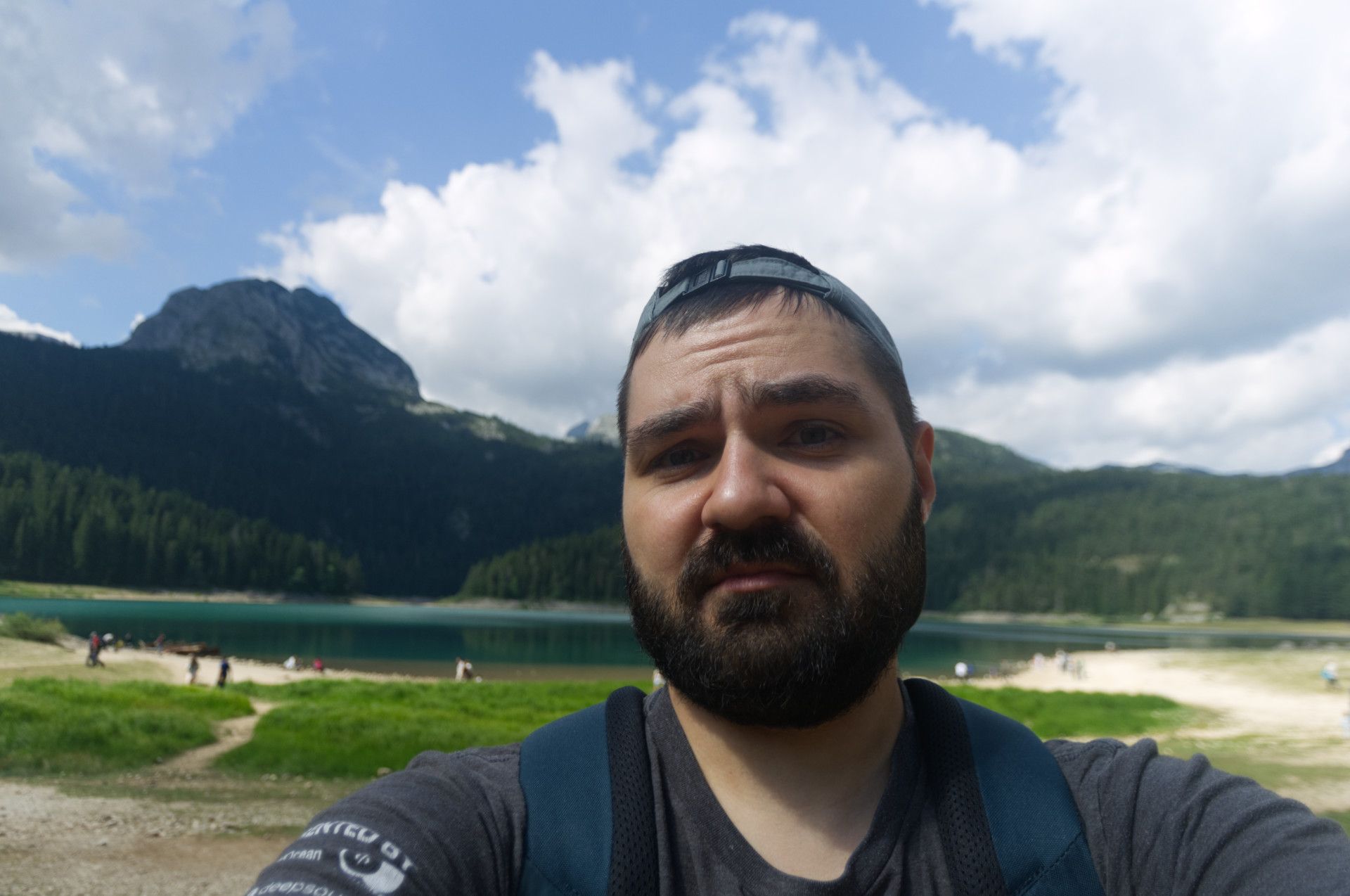 A photo of me against the lake and the mountains